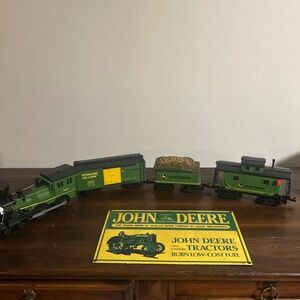 John Deere tin sign and train